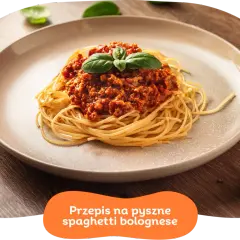 Pyszne spaghetti bolognese z aromatycznym sosem mięsnym i świeżą bazylią. Idealne na szybki obiad.