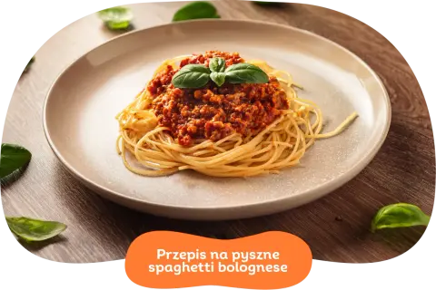 Pyszne spaghetti bolognese z aromatycznym sosem mięsnym i świeżą bazylią. Idealne na szybki obiad.