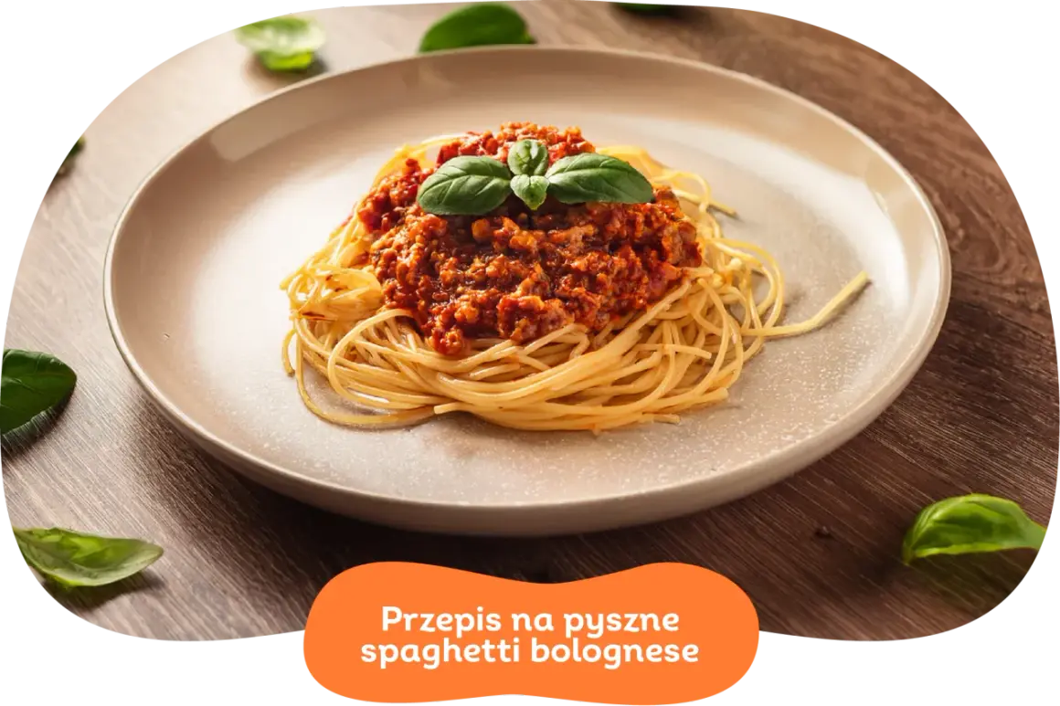 Pyszne spaghetti bolognese z aromatycznym sosem mięsnym i świeżą bazylią. Idealne na szybki obiad.