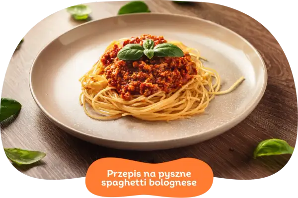 Pyszne spaghetti bolognese z aromatycznym sosem mięsnym i świeżą bazylią. Idealne na szybki obiad.